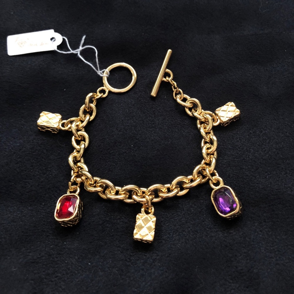Park Lane charm bracelet,gold w/ multicol’d crysts